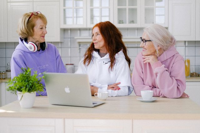 three-women-working-at-laptop-in-kitchen-pexels-anna-shvets